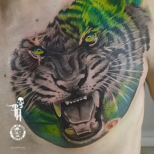 tatuajes realistas tigres realizados por Tony Atichati
